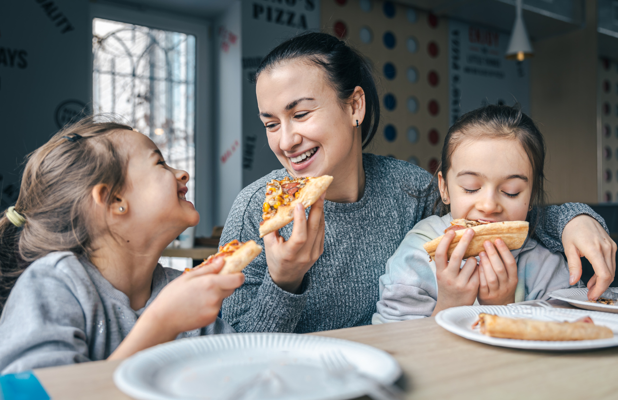 Family eating pizza