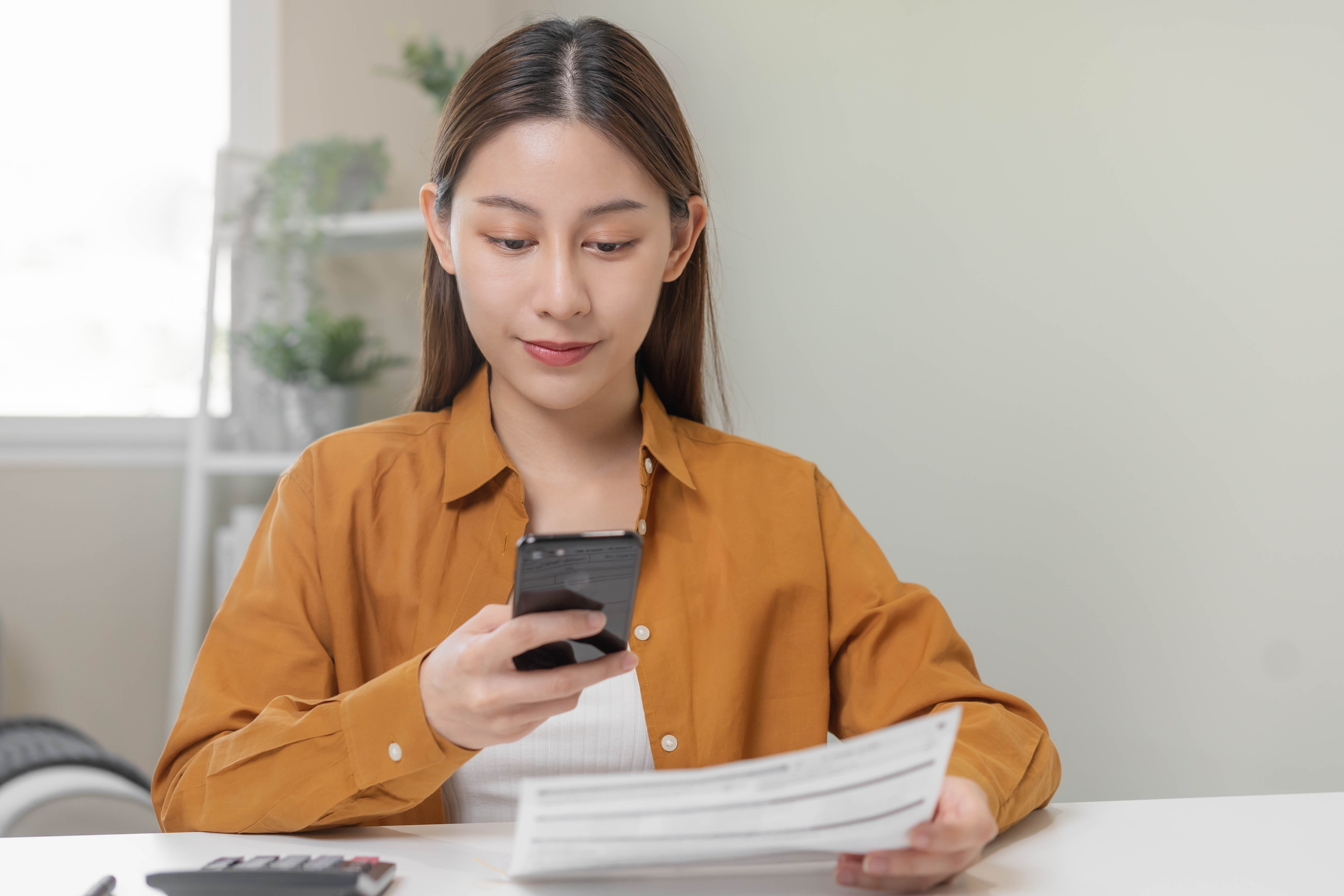 Woman looking at her phone