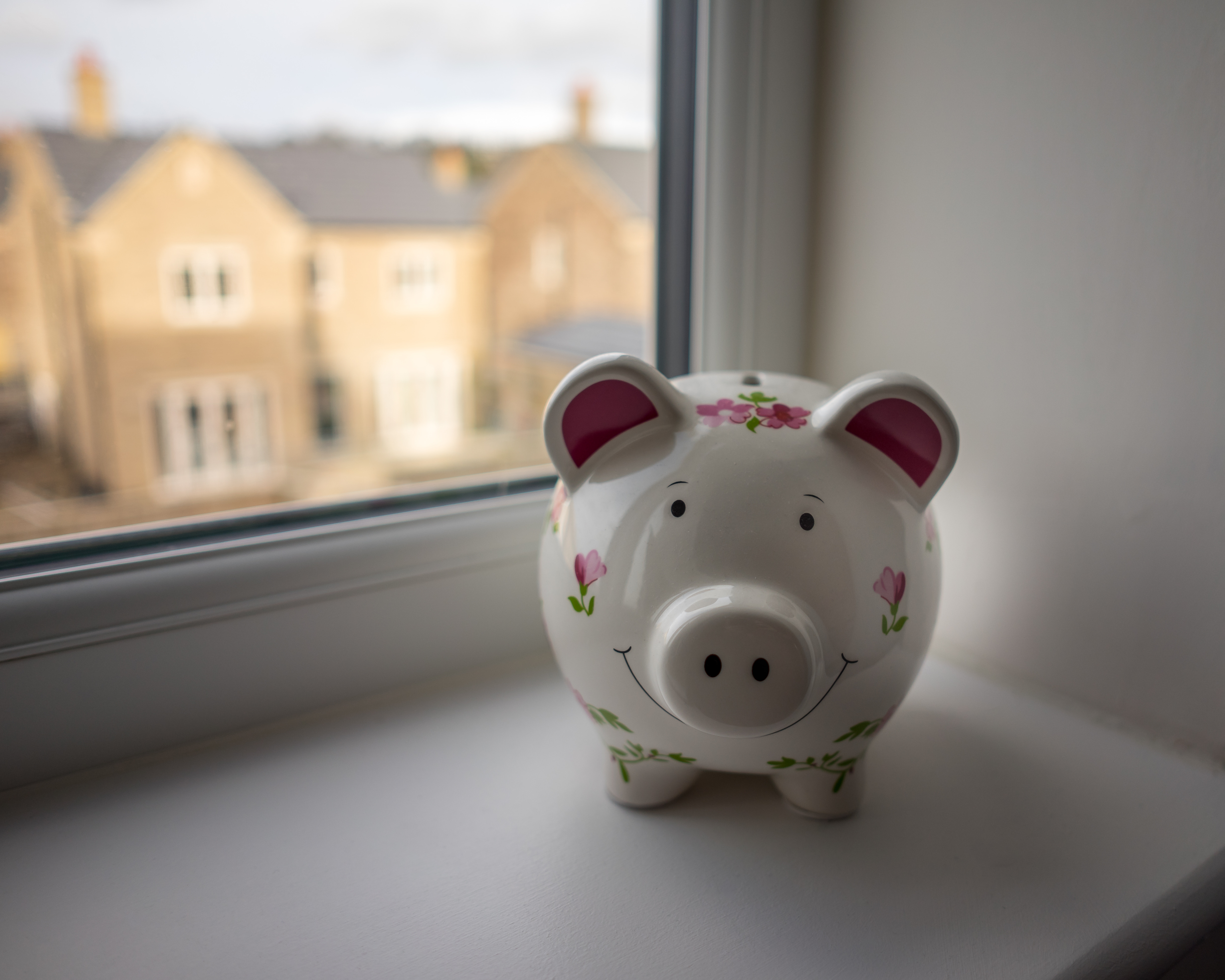 Piggy bank on the windowsill