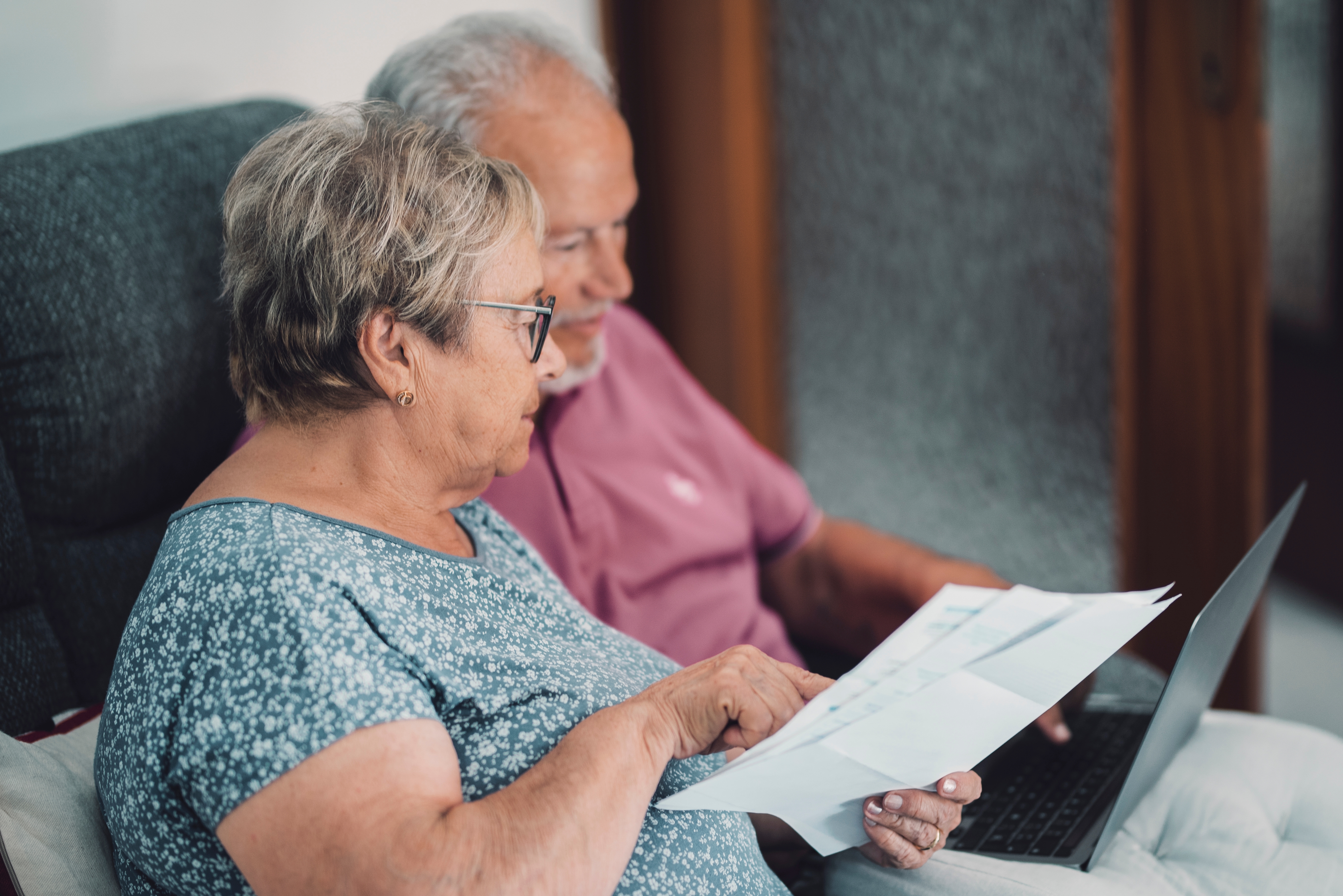 older couple looking at laptop